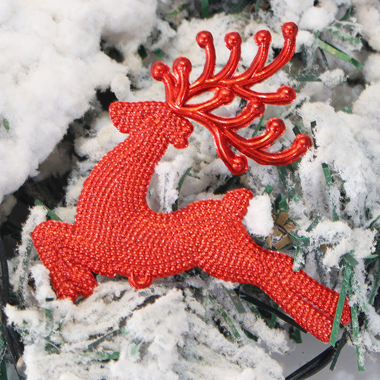 Holiday tree ornament with classic reindeer motif