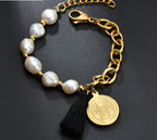 Jesus pendant on stainless steel bracelet close-up