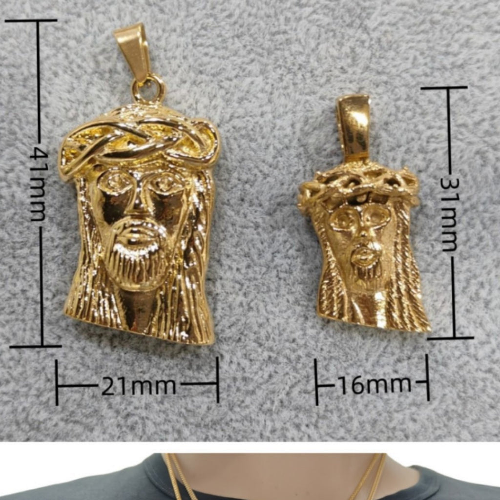 Jesus pendant laid flat showing detailed Christ imagery