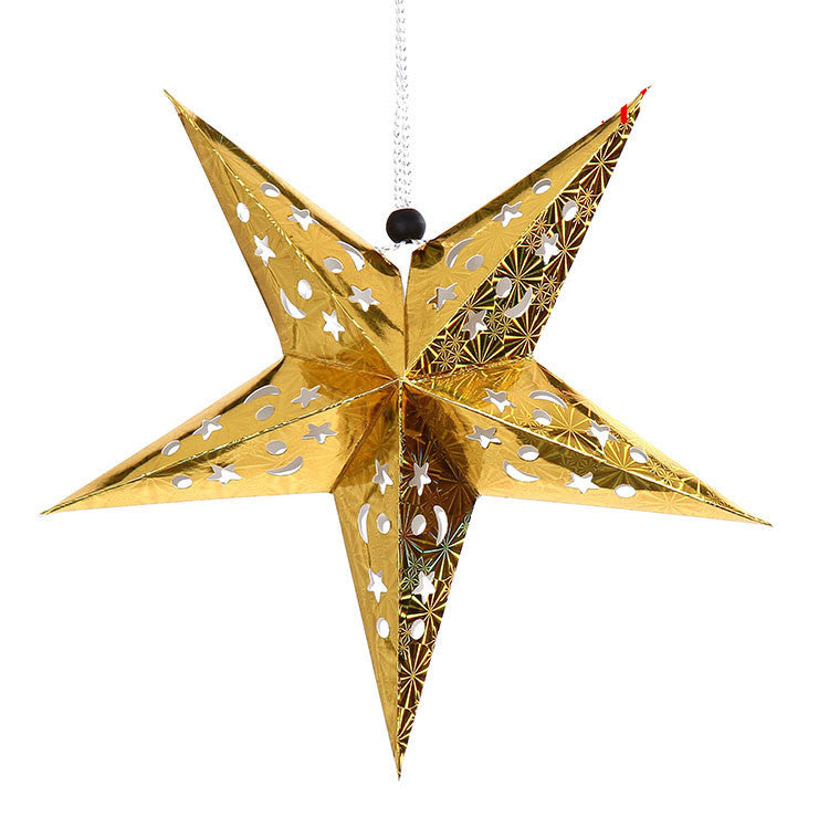 Multiple star ornaments in gold and silver for holiday decorating
