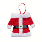Close-up of red Christmas napkin holder in jacket shape