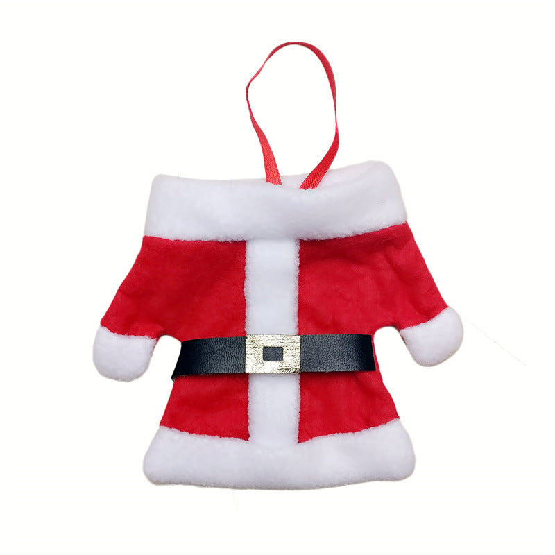 Close-up of red Christmas napkin holder in jacket shape