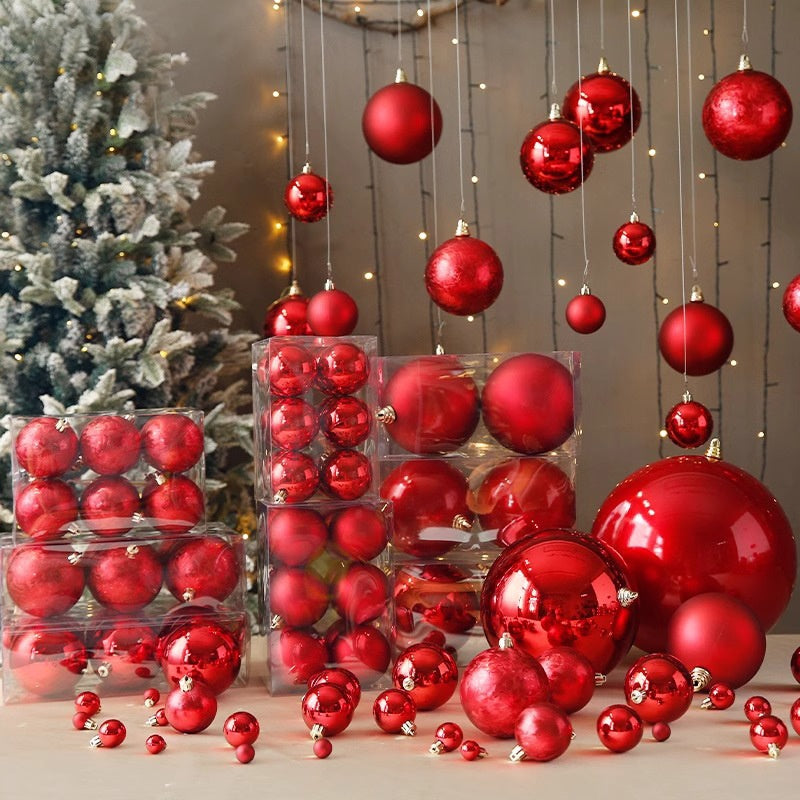 Set of red Christmas ornament balls arranged in decorative display