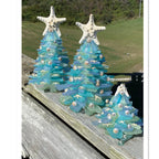 Creative blue Christmas tree ornament with coastal aesthetic for holiday displays