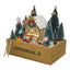 Lantern-lit wooden cabin Christmas ornament glowing warmly on a shelf