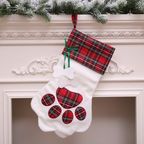 Close-up of dog paw Christmas stocking festive details
