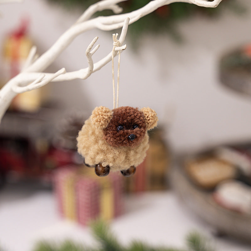 Brown and white plush felt puppy pendant side by side