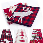 Cozy Christmas dining setup with elk and snowman table runner centerpiece