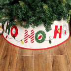 Creative lettering Christmas tree skirt covering tree stand base