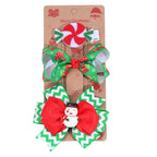 Christmas bow hairpins in multiple colors laid out for viewing