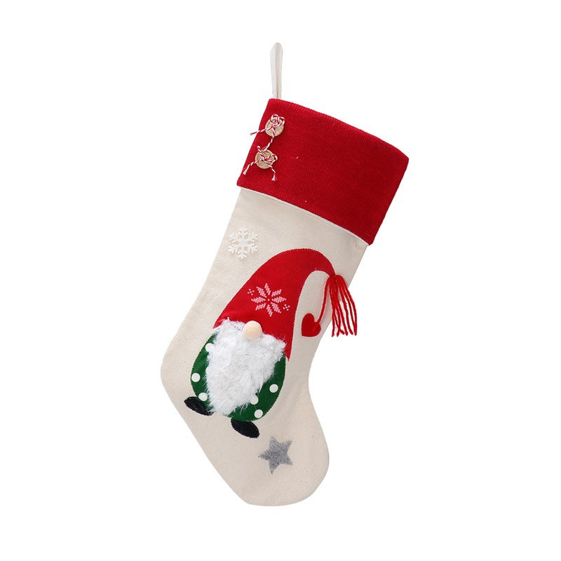 Green striped Christmas sock gift bag in soft cloth for holiday celebrations
