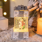 Red Christmas gift box ornament with integrated lights for festive home decor