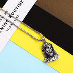 Jesus necklace displayed against neutral background
