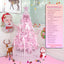 Pink 5FT pencil Christmas tree in a cozy living room setting with warm lighting