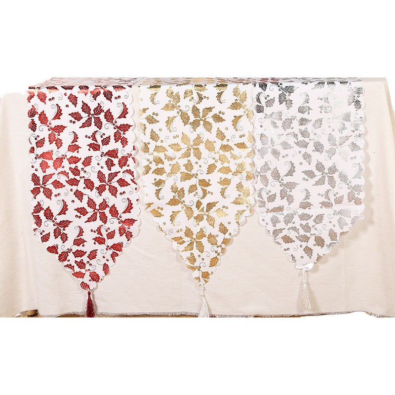 Christmas Star Snowflake Table Runner - Elegant table runner with silver snowflake and star motifs on festive cloth