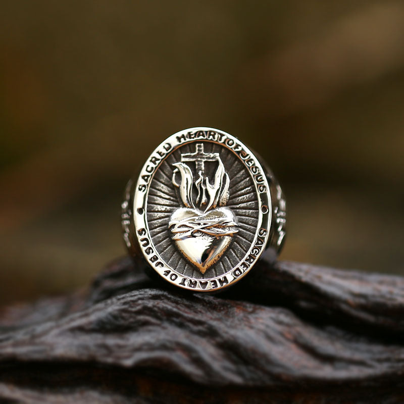 Bold vintage ring featuring the Sacred Heart of Jesus religious motif