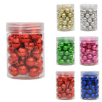 Set of rose and green glossy Christmas decorations