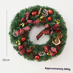 Christmas wreath decoration with garland bow as festive window hanging