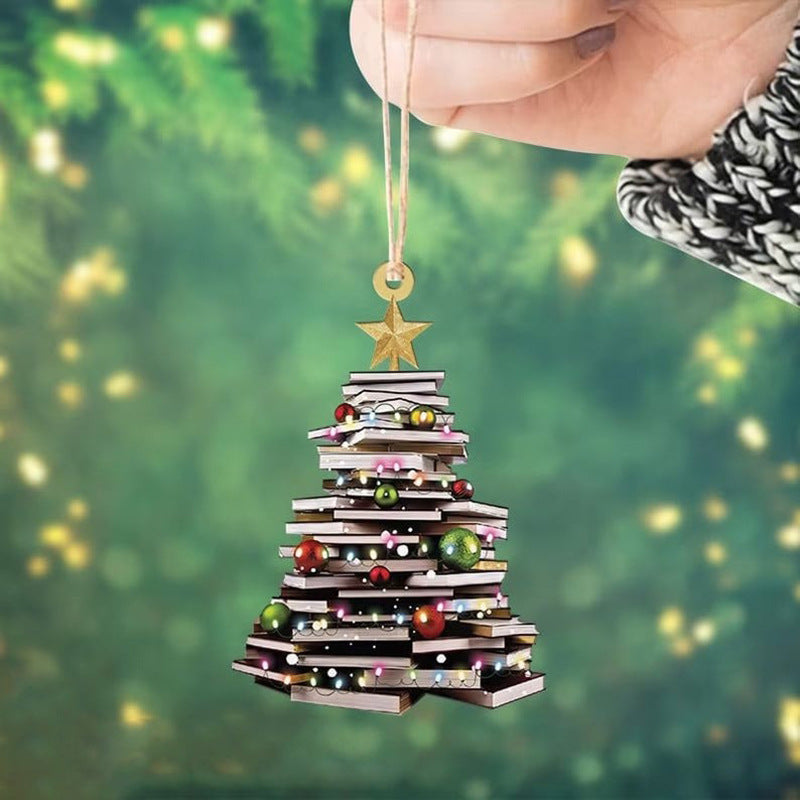 Colorful acrylic pendant featuring book and tree design for holiday display
