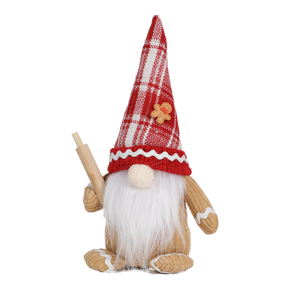Set of two faceless elderly knitted doll Christmas ornaments displayed together