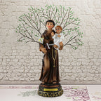 Nativity scene resin figures featuring Virgin Mary holding Baby Jesus