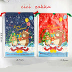 Christmas bear drawstring bags arranged for holiday gift packaging