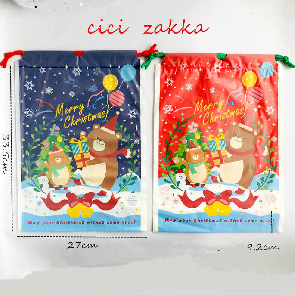 Christmas bear drawstring bags arranged for holiday gift packaging