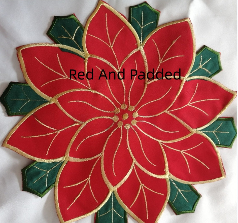 Red flowers and green leaves embroidery detail on polyester tablecloth