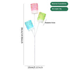 Pastel holiday twig cutting decoration showcasing soft foam blooms in gentle seasonal colors