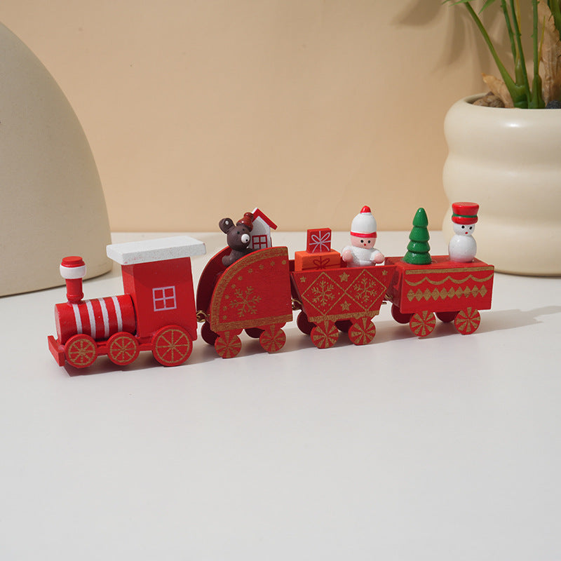 Festive wooden train Christmas decoration for window display in warm holiday colors Main image