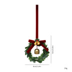 Holiday decoration pendant featuring green foliage and pine cone elements