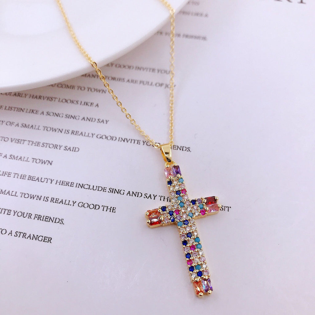 Classic cross pendant on O-chain necklace in gold