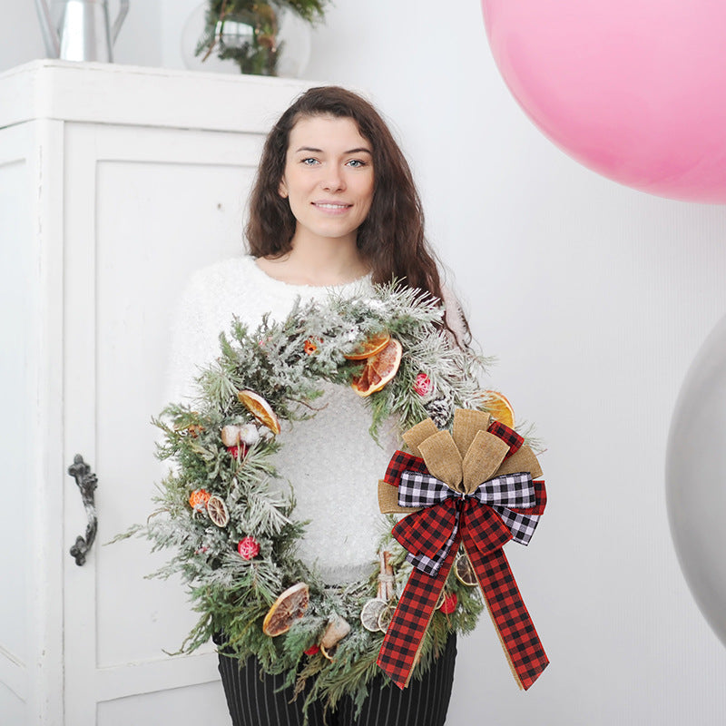 Festive plaid bowknot Christmas ornament hanging on tree