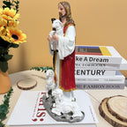 Detailed view of shepherd figure in traditional nativity resin sculpture