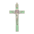 Detailed view of Jesus icon engraved on luminous green Catholic cross pendant