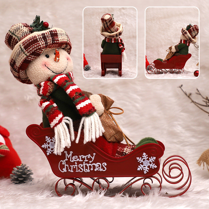 Close-up view of cloth sled doll ornament detail and texture