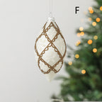 Hand-painted glass Christmas ornament with diamond shape on Christmas tree