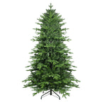 Christmas tree display with warm lighting in a home setting
