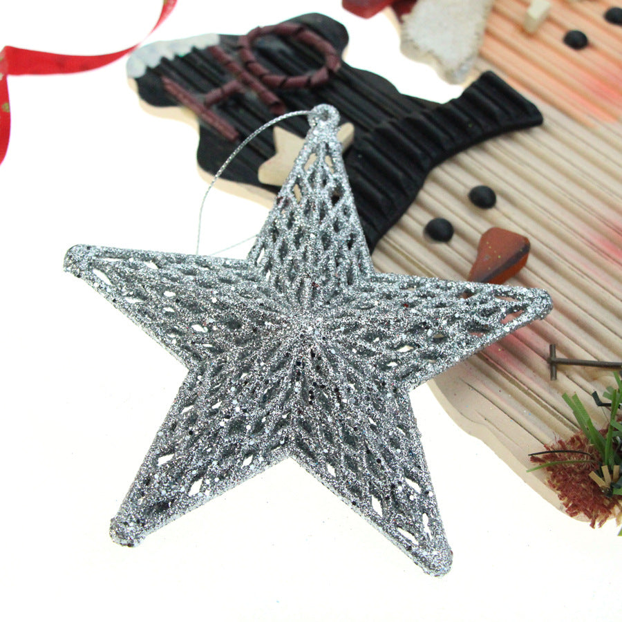 Gold-finish plastic star ornament representing the Star of Bethlehem faith symbol