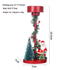 Resin Christmas figurine displayed on wooden shelf - Christmas Decor