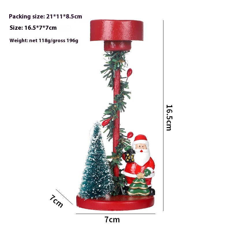 Resin Christmas figurine displayed on wooden shelf - Christmas Decor