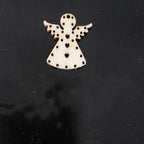 European cartoon style Christmas wood pendant ornament close-up