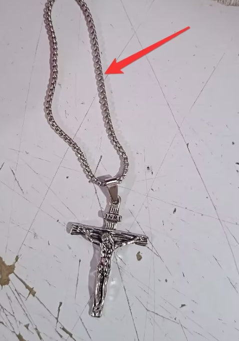 Multiple angles of vintage cross pendant necklace display