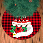 Cozy flannel tree skirt concealing tree stand in living room