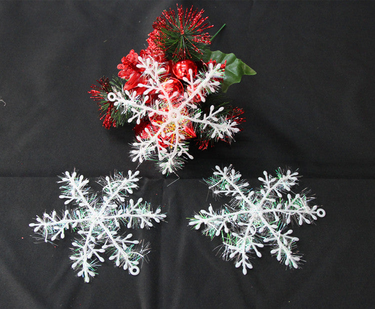 Plastic snowflakes displayed as Christmas tree decorations