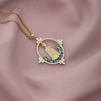 Elegant Virgin Mary pendant necklace with geometric detailing and metal finish