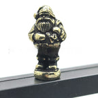 Festive hinged Santa Claus ornament with metal construction hanging from branch
