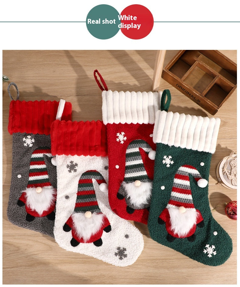Green embroidered Christmas stocking for festive holiday celebrations