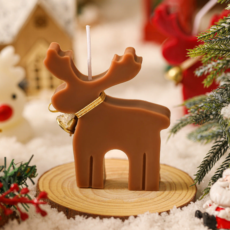 Close-up of intricate elk shape on handmade Christmas aromatherapy candle
