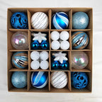 Blue and gold Christmas ball pendant ornaments in paper packaging